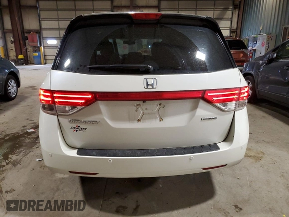 2014 Honda Odyssey Touring with VIN 5FNRL5H90EB137575, listed as a Copart auction lot 54606535 with 168,714 mi miles and Salvage title. Bid and sale history available at DreamBid. Image 6.