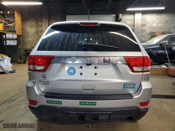 2011 Jeep Grand Cherokee Laredo with VIN 1J4RR4GG0BC583821, listed as a Copart auction lot 59176674 with 198,027 mi miles and Salvage Title. Bid and sale history available at carsss.com. Image 6.