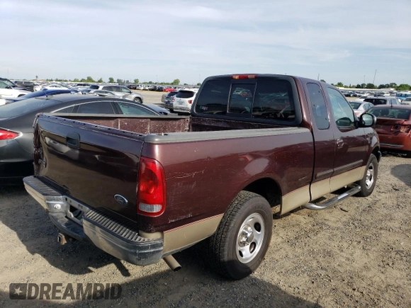2000 Ford F-150 with VIN 1FTRX17W5YKA50203, listed as a Copart auction lot 54734615 with Not Provided miles and Salvage Title. Bid and sale history available at DreamBid. Image 3.