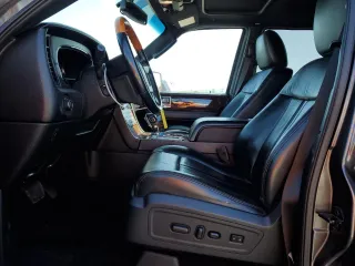 2015 Lincoln Navigator z VIN 5LMJJ3HT2FEJ12367, wystawiony jako Copart lot #56930865 z przebiegiem 71 415 mil mil oraz Szkody całkowita. Historia ofert i sprzedaży dostępna na DreamBid. Obrazek 7.