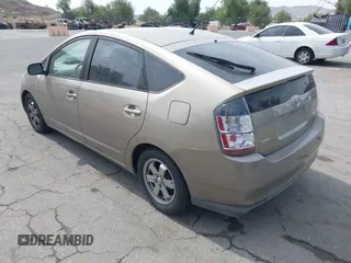 2004 Toyota Prius with VIN JTDKB20U640070142, listed as a IAAI auction lot 42235853 with 111,700 mi miles and . Bid and sale history available at DreamBid. Image 3.