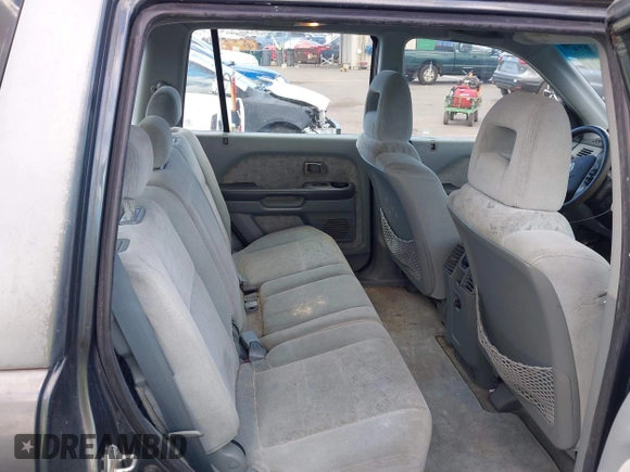 2004 Honda Pilot LX with VIN 2HKYF18114H591405, listed as a IAAI auction lot 42386073 with 71,295 mi miles and . Bid and sale history available at DreamBid. Image 8.
