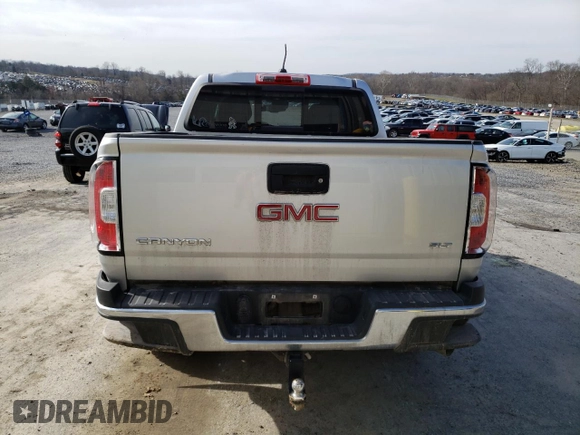 2017 GMC Canyon 4WD SLT with VIN 1GTP6DE13H1176973, listed as a Copart auction lot 46206954 with 99,050 mi miles and Salvage Title. Bid and sale history available at carsss.com. Image 6.