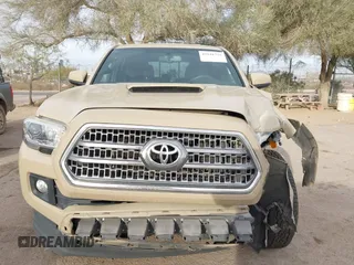 2017 Toyota Tacoma SR5 with VIN 3TMCZ5AN2HM063328, listed as a IAAI auction lot 41541775 with 137,610 mi miles and . Bid and sale history available at DreamBid. Image 13.