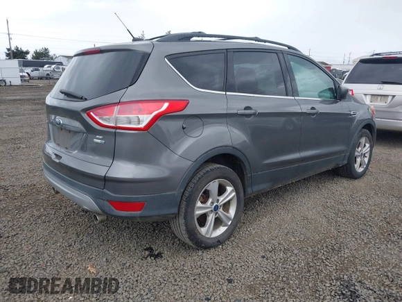 2013 Ford Escape SE with VIN 1FMCU9GX4DUB84247, listed as a IAAI auction lot 40427032 with 201,151 mi miles. Bid and sale history available at carsss.com. Image 4.