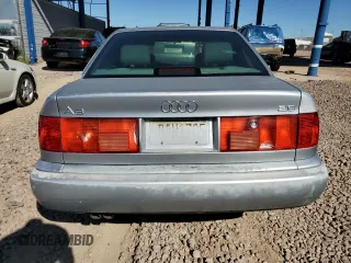 1996 Audi A6 z VIN WAUFA84A9TN007235, wystawiony jako Copart lot #78278774 z przebiegiem 148 857 mil mil oraz Tytuł czysty. Historia ofert i sprzedaży dostępna na DreamBid. Obrazek 6.