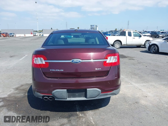 2011 Ford Taurus SEL with VIN 1FAHP2EW8BG137937, listed as a IAAI auction lot 42107586 with 143,525 mi miles. Bid and sale history available at carsss.com. Image 17.