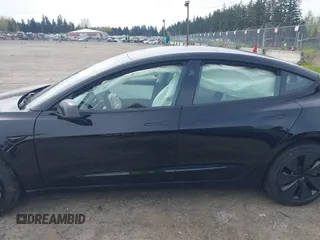 2025 Tesla Model 3 Long Range with VIN 5YJ3E1EB1SF885103, listed as a IAAI auction lot 41926295 with Not provided miles and . Bid and sale history available at DreamBid. Image 14.