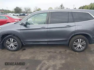 2017 Honda Pilot EX-L with VIN 5FNYF6H5XHB029443, listed as a IAAI auction lot 41992115 with 154,399 mi miles and . Bid and sale history available at DreamBid. Image 14.
