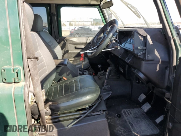 1999 Land Rover Defender with VIN SALLDHM87YA180832, listed as a Copart auction lot 49849015 with Not provided miles and Clean title. Bid and sale history available at DreamBid. Image 7.