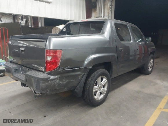 2011 Honda Ridgeline RTL with VIN 5FPYK1F57BB004189, listed as a IAAI auction lot 41871741 with 193,913 mi miles. Bid and sale history available at carsss.com. Image 4.