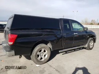 2004 Nissan Titan SE with VIN 1N6AA06A34N578875, listed as a Copart auction lot 81799754 with 240,085 mi miles and Salvage Title. Bid and sale history available at carsss.com. Image 3.