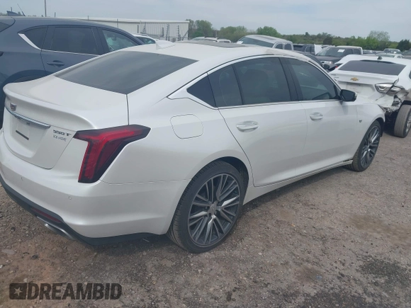 2024 Cadillac CT5 Premium Luxury z VIN 1G6DT5RW3R0129279, wystawiony jako IAAI lot #42011369 z przebiegiem 5 477 mil mil oraz . Historia ofert i sprzedaży dostępna na DreamBid. Obrazek 4.