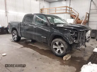 2022 Ram 1500 Laramie with VIN 1C6SRFJT2NN348443, listed as a IAAI auction lot 41517042 with 61,498 mi miles and . Bid and sale history available at DreamBid. Image 1.