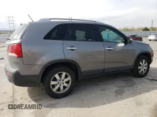2013 Kia Sorento LX with VIN 5XYKTDA21DG401970, listed as a Copart auction lot 54079365 with 217,969 mi miles and Salvage title. Bid and sale history available at DreamBid. Image 3.