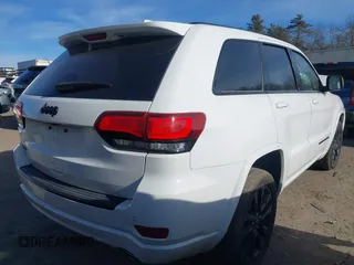 2017 Jeep Grand Cherokee Laredo with VIN 1C4RJFAG9HC910422, listed as a IAAI auction lot 41185537 with 84,784 mi miles. Bid and sale history available at carsss.com. Image 4.
