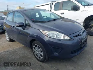 2013 Ford Fiesta SE with VIN 3FADP4EJ6DM205708, listed as a IAAI auction lot 42051721 with 139,143 mi miles. Bid and sale history available at carsss.com. Image 1.