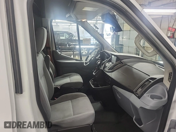 2019 Ford Transit z VIN 1FTYR2CG7KKA96911, wystawiony jako IAAI lot #42566551 z przebiegiem 207 807 mil mil oraz . Historia ofert i sprzedaży dostępna na DreamBid. Obrazek 26.