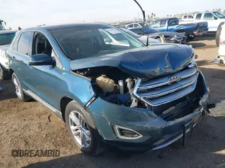 2016 Ford Edge SEL z VIN 2FMPK3J92GBB94624, wystawiony jako IAAI lot #41682327 z przebiegiem 106 232 mil mil oraz . Historia ofert i sprzedaży dostępna na DreamBid. Obrazek 1.