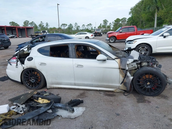 2016 Porsche Panamera 4 z VIN WP0AA2A78GL006176, wystawiony jako IAAI lot #41987545 z przebiegiem Nie podano mil oraz . Historia ofert i sprzedaży dostępna na DreamBid. Obrazek 13.