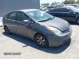 2008 Toyota Prius z VIN JTDKB20U183342116, wystawiony jako IAAI lot #42303001 z przebiegiem Nie podano mil oraz . Historia ofert i sprzedaży dostępna na DreamBid. Obrazek 1.