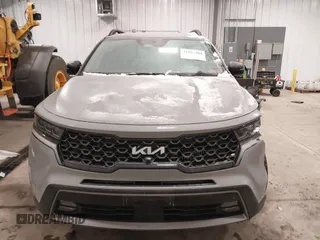 2023 Kia Sorento SX z VIN 5XYRKDLF0PG189570, wystawiony jako IAAI lot #41587404 z przebiegiem 22 006 mil mil oraz . Historia ofert i sprzedaży dostępna na DreamBid. Obrazek 13.