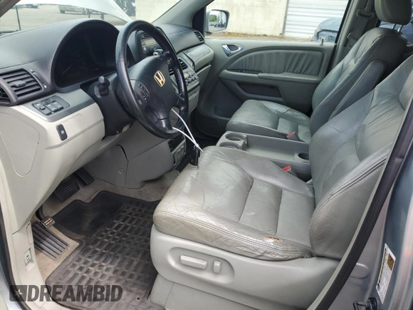 2006 Honda Odyssey EX-L z VIN 5FNRL38796B104224, wystawiony jako Copart lot #59049985 z przebiegiem 161 476 mil mil oraz Czysty tytuł • Clean title. Historia ofert i sprzedaży dostępna na DreamBid. Obrazek 7.