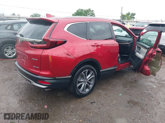 2021 Honda CR-V Touring with VIN 2HKRW2H9XMH663315, listed as a IAAI auction lot 42188893 with 26,203 mi miles and . Bid and sale history available at DreamBid. Image 4.