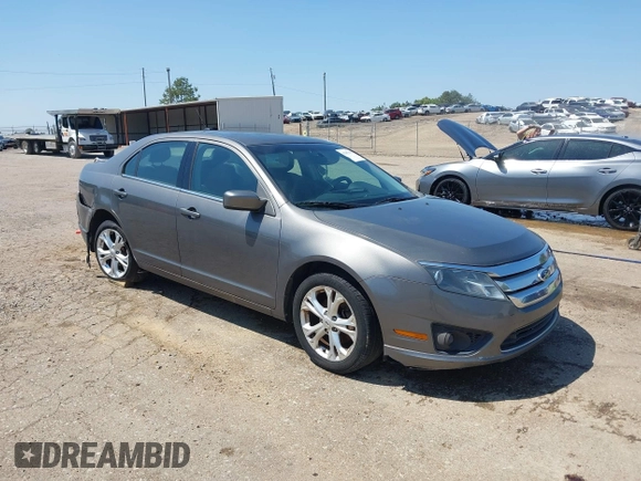 2012 Ford Fusion SE z VIN 3FAHP0HA4CR232641, wystawiony jako IAAI lot #42057070 z przebiegiem 180 793 mil mil oraz . Historia ofert i sprzedaży dostępna na DreamBid. Obrazek 1.