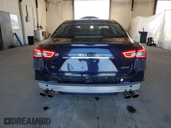 2015 Maserati Ghibli z VIN ZAM57XSA2F1159438, wystawiony jako Copart lot #52530965 z przebiegiem 73 996 mil mil oraz Szkoda całkowita • Salvage title. Historia ofert i sprzedaży dostępna na DreamBid. Obrazek 6.