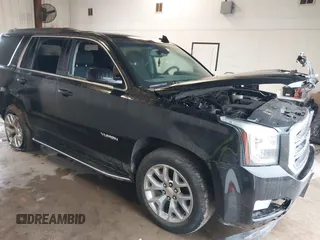 2019 GMC Yukon SLE with VIN 1GKS1AKCXKR351472, listed as a IAAI auction lot 41354374 with 48,569 mi miles. Bid and sale history available at carsss.com. Image 1.