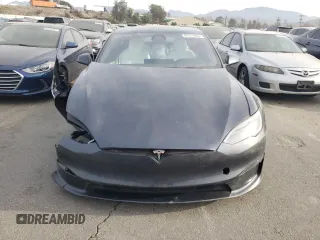 2023 Tesla Model S Plaid с VIN 5YJSA1E67PF528820, выставлен на аукционе Copart как лот 83111464 с пробегом 17 858 миль миль и Списание • Salvage title. История ставок и продаж доступна на DreamBid. Изображение 5.