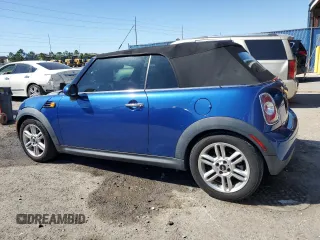 2014 MINI Convertible z VIN WMWZN3C58ET861186, wystawiony jako Copart lot #50585755 z przebiegiem 81 459 mil mil oraz Szkoda całkowita • Salvage title. Historia ofert i sprzedaży dostępna na DreamBid. Obrazek 2.