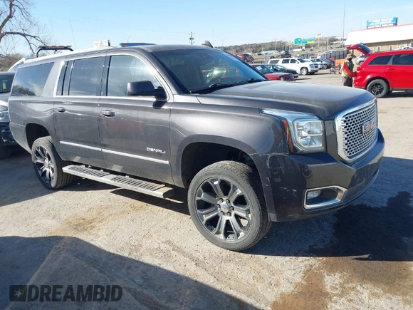 2015 GMC Yukon XL Denali with VIN 1GKS2JKJ9FR634771, listed as a IAAI auction lot 41676218 with 73,271 mi miles. Bid and sale history available at carsss.com. Image 1.