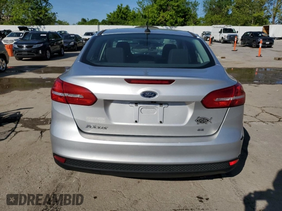 2017 Ford Focus SE z VIN 1FADP3F29HL339332, wystawiony jako Copart lot #56556735 z przebiegiem 93 050 mil mil oraz Szkoda całkowita • Salvage title. Historia ofert i sprzedaży dostępna na DreamBid. Obrazek 6.
