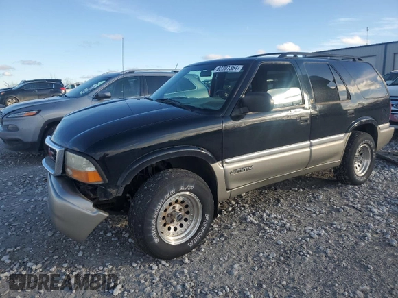 2000 GMC Jimmy SLE Convenience z VIN 1GKDT13W7Y2393191, wystawiony jako Copart lot #82301364 z przebiegiem 160 004 mil mil oraz Czysty tytuł • Clean title. Historia ofert i sprzedaży dostępna na DreamBid. Obrazek 1.