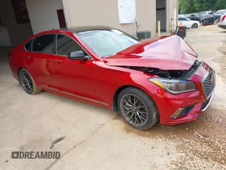 2018 Genesis G80 Sport z VIN KMHGN4JB7JU279816, wystawiony jako IAAI lot #42357407 z przebiegiem 57 956 mil mil oraz . Historia ofert i sprzedaży dostępna na DreamBid. Obrazek 1.