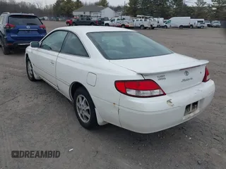 2000 Toyota Solara SE with VIN 2T1CG22P0YC393112, listed as a IAAI auction lot 41677631 with 253,406 mi miles. Bid and sale history available at carsss.com. Image 3.