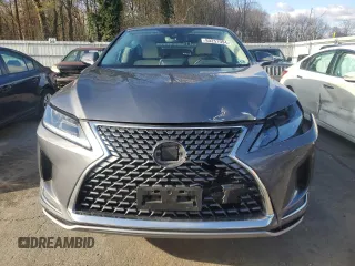 2021 Lexus RX with VIN 2T2AZMDA7MC275120, listed as a Copart auction lot 80251094 with 8,595 mi miles and Salvage Title. Bid and sale history available at carsss.com. Image 5.