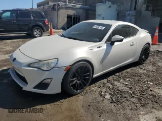2014 Scion FR-S with VIN JF1ZNAA13E9705003, listed as a Copart auction lot 48236105 with 119,898 mi miles and Salvage Title. Bid and sale history available at DreamBid. Image 1.