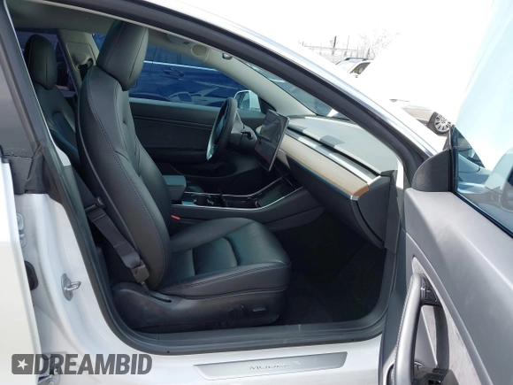 2020 Tesla Model 3 Long Range with VIN 5YJ3E1EB9LF795246, listed as a IAAI auction lot 41895750 with 163,061 mi miles and . Bid and sale history available at DreamBid. Image 5.