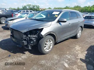 2016 Kia Sorento LX with VIN 5XYPGDA33GG136850, listed as a IAAI auction lot 42030317 with 120,798 mi miles and . Bid and sale history available at DreamBid. Image 2.