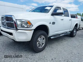 2012 Ram 2500 Laramie Longhorn with VIN 3C6UD5GL1CG121386, listed as a IAAI auction lot 42119700 with 207,173 mi miles and . Bid and sale history available at DreamBid. Image 2.