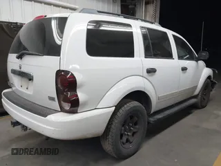 2005 Dodge Durango SLT z VIN 1D4HD48D75F519320, wystawiony jako IAAI lot #42380006 z przebiegiem 84 625 mil mil oraz . Historia ofert i sprzedaży dostępna na DreamBid. Obrazek 4.