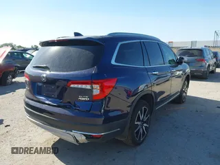 2020 Honda Pilot Elite with VIN 5FNYF6H02LB054348, listed as a IAAI auction lot 42302525 with 43,916 mi miles and . Bid and sale history available at DreamBid. Image 4.