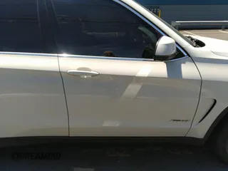 2014 BMW X5 xDrive35i z VIN 5UXKR0C56E0H20868, wystawiony jako IAAI lot #42321833 z przebiegiem 134 064 mil mil oraz . Historia ofert i sprzedaży dostępna na DreamBid. Obrazek 13.