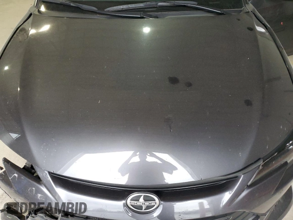 2016 Scion tC z VIN JTKJF5C75GJ022789, wystawiony jako Copart lot #54305435 z przebiegiem 49 007 mil mil oraz Szkody całkowita. Historia ofert i sprzedaży dostępna na DreamBid. Obrazek 11.