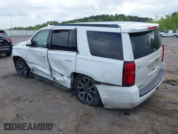 2017 Chevrolet Tahoe LS with VIN 1GNSCAKC5HR312729, listed as a IAAI auction lot 41928484 with 206,999 mi miles and . Bid and sale history available at DreamBid. Image 3.