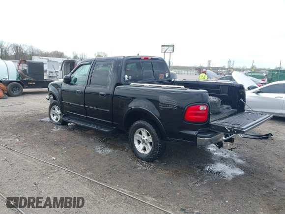 2002 Ford F-150 XLT with VIN 1FTRW08L32KD90202, listed as a IAAI auction lot 41850546 with 256,807 mi miles. Bid and sale history available at carsss.com. Image 3.