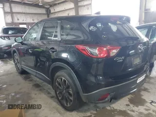 2016 Mazda CX-5 Grand Touring with VIN JM3KE4DY5G0816575, listed as a IAAI auction lot 42101340 with 180,762 mi miles and . Bid and sale history available at carsss.com. Image 3.